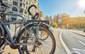 Bicycles parked on a city street. Cycling or commuting in the urban environment, ecological transport concept Royalty Free Stock Photo