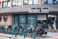 Bicycles parked and locked on a shopping street in Dutch town outside Rendez Vous Cafe