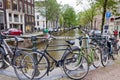 Bicycles parked on Paulusbroedersluis bridge in Amsterdam