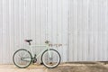 Bicycles parked on the sheet metal side wall Royalty Free Stock Photo
