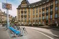 Bicycles for rent on a background of bank building Banque et Caisse d'Ãâ°pargne de l'Ãâ°tat Royalty Free Stock Photo