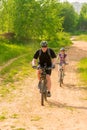 Bicycles ride on a country road