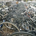 Bicycles stalled at a train station.