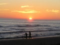 Bicycles on sunset beach Royalty Free Stock Photo