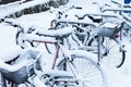 Bicycles under snow winter in Munich, Germany