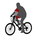 Bicyclist with baby in bicycle chair Royalty Free Stock Photo