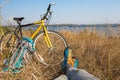 Bicyclist in bright sporty Shoes resting on Grass