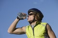 Bicyclist Drinking Water From Bottle