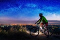 Bicyclist with mountain bike on top of the hill Royalty Free Stock Photo