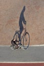 Bicyclist riding bicycle top view with shadow