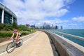 Bicyclist riding along Chicago`s lakefront