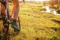 Bicyclist riding down the field to the river Royalty Free Stock Photo