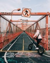 Bicyclist on the Williamsburg Bridge bike path, in Brooklyn, New York City