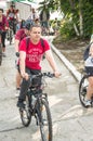 Bicyclists, adults and children, their portraits