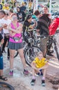 Bicyclists, adults and children, their portraits