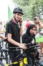 Bicyclists, adults and children, their portraits