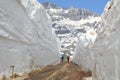 Bicyclists passing through snowdrift