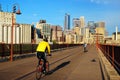 Bike Riding on the Stone Arch Bridge, Minneapolis Royalty Free Stock Photo