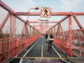 Bicyclists on the Williamsburg Bridge bike path, in Brooklyn, New York City