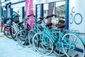 Bicyles Parked Along A Shop Or Store Exterior