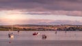 BIDEFORD, DEVON, ENGLAND - MAY 11 2021: Sunset over the River Torridge near Bideford. Looking towards Instow and