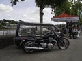 BIDEFORD, NORTH DEVON, UK - MAY 28 2023: Triumph motorcycle with sidecar coffin for funeral services parked up at