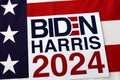 Biden Harris 2024 Written over Waving American Flag