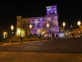 Sulkowski Castle on main square in historical city center and violet illumination in Bielsko-Biala city at night, Poland