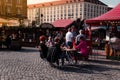 Biergarten at Altmarkt. People in a beer garden pub.