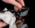 Bifocal glasses getting cleaned with a cloth Royalty Free Stock Photo