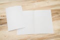 Bifold white template paper on wood