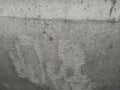 Big abrasion on gray concrete wall texture background,Gray color-monochrome tone. Selective focus on abrasion