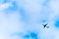 Big airplane in air on blue sky Royalty Free Stock Photo
