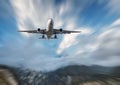 Big airplane mith motion blur effect at sunny bright day Royalty Free Stock Photo