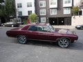 Big alloy wheels - old American wrack cadillac - San Francisco streets