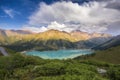 Big Almaty Lake in Tien Shan mountains of Kazakhstan. Panorama of Beautiful mountain landscape on a summer evening Royalty Free Stock Photo