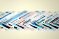 Big amount of driving licenses from various USA states. Stack of driving license specimen Royalty Free Stock Photo