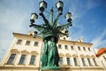 Big ancient lamp post on street of historical Prague Royalty Free Stock Photo