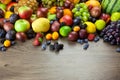 Big assortment of Fresh Organic Fruits, frame composition on woo Royalty Free Stock Photo