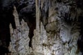 Big Azishskaya cave with speleothem, stalactites, stalagmites and stalagnates in