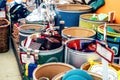 Big barrels with different recycling materials in a shop. Royalty Free Stock Photo