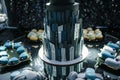 big beautiful black wedding cake stands on a table close up Royalty Free Stock Photo
