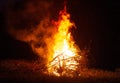 Big beautiful bonfire in the night forest in the holiday bath. Tourism and recreation in the forest against the background of the Royalty Free Stock Photo