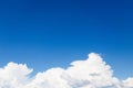 Big beautiful white fluffy cloud on clear blue sky background. Copy space Royalty Free Stock Photo