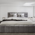 Big bed with gray and quilted frame Royalty Free Stock Photo