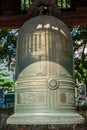 Big bell on side of Imperial Academy in Temple of Literature Van Mieu, the first national university in Hanoi Royalty Free Stock Photo