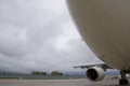 Big Belly of Cargo Plane Readies for Takeoff from Runway