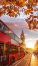 Big Ben against colorful sunset with red bus during autumn in London, England Royalty Free Stock Photo
