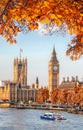 Big Ben with autumn leaves in London, England, UK Royalty Free Stock Photo