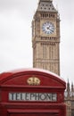 Big Ben clock and a blurred traditional red telephone booth in London Royalty Free Stock Photo